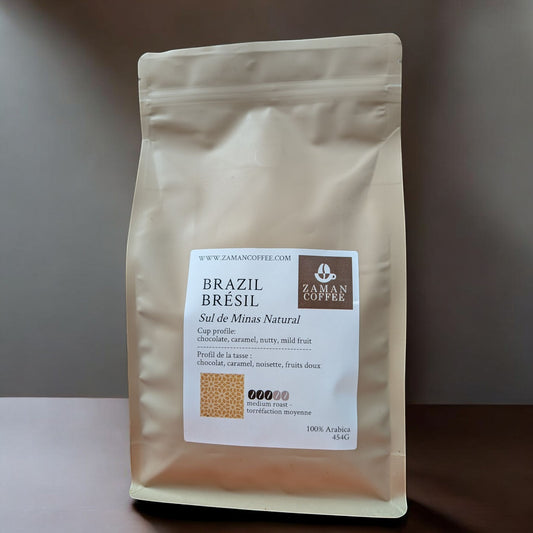 ZAMAN COFFEE Brazil Sul de Minas Natural medium roast coffee beans in a beige stand-up pouch.